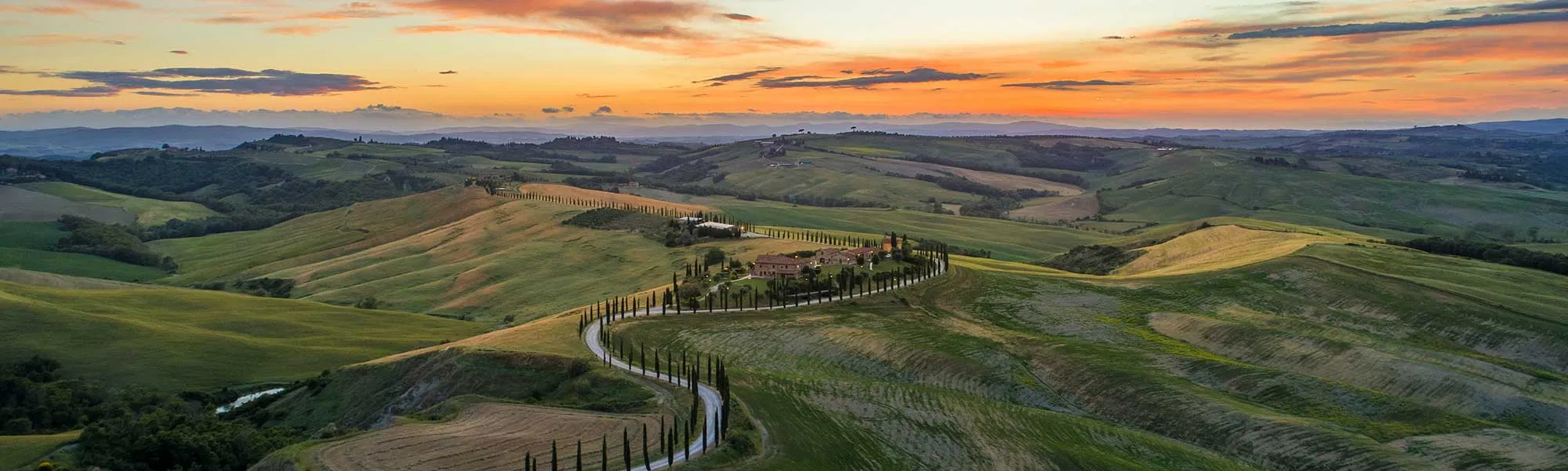 Golden-hour Tuscan villa and countryside
